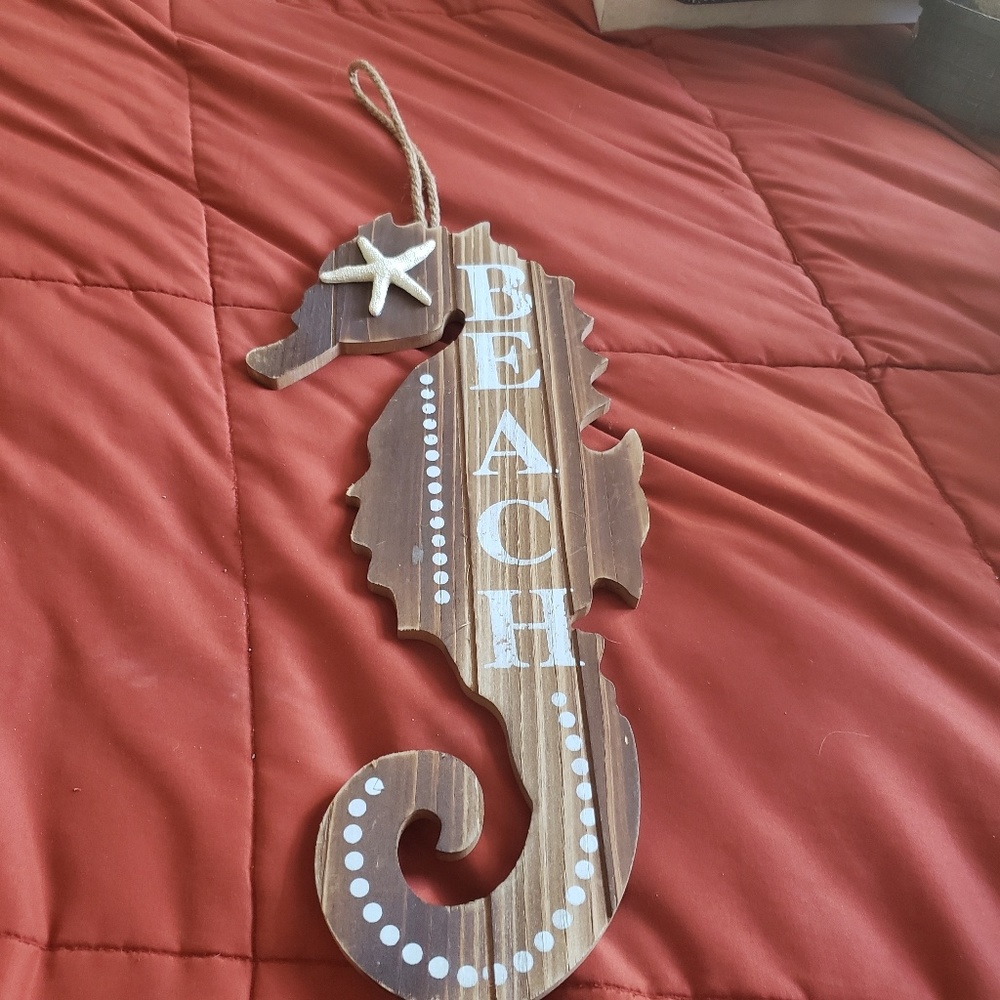 Wooden beach themed signs